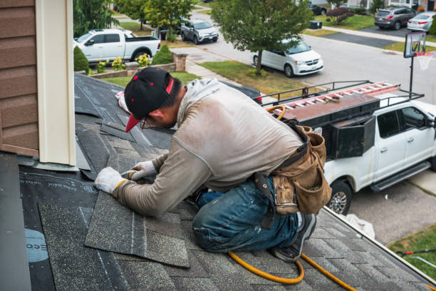 Professional Roofing technician working in Mount Vernon, IA